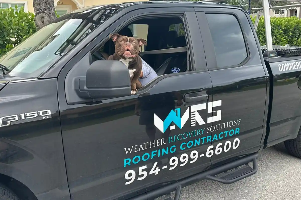 Weather Recovery Solutions owners Sam and Andreia Medina attending a national roofing industry conference to stay updated on the latest Florida Building Code requirements and roofing technologies.