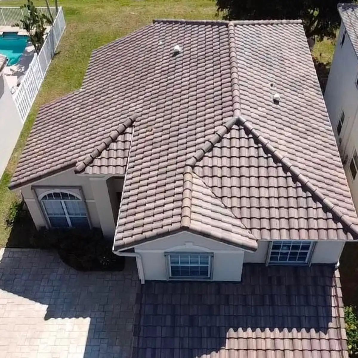 Custom tile roof replacement in Lake Worth, FL, featuring Florida Building Code compliant underlayment by Weather Recovery Solutions.
