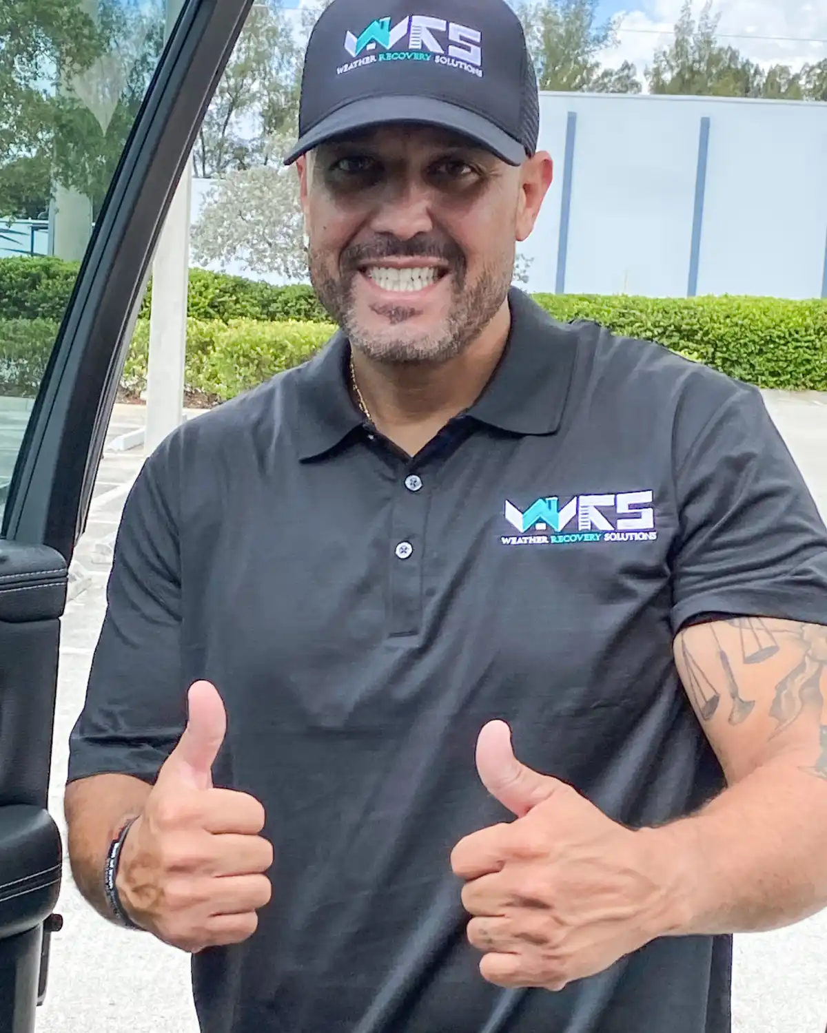 Weather Recovery Solutions owner Sam Medina providing an emergency roof inspection and storm damage consultation for a local homeowner.